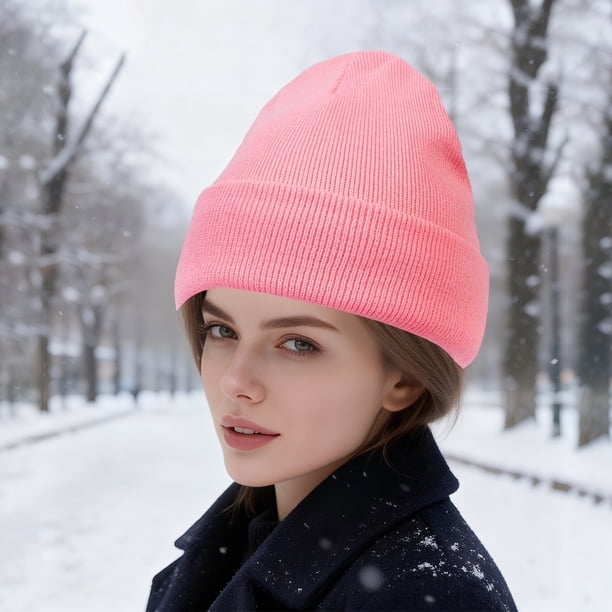 Blonde Waves Tucked Under a Pink Beanie Blonde Waves Tucked Under a Pink Beanie — Winter Hat Hairstyles