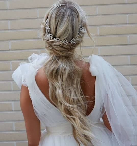 Ash Blonde Braided Updo With Floral Accessory Ash Blonde Braided Updo With Floral Accessory — Winter Wedding Hairstyles