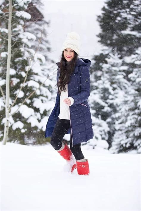 Vibrant Red Rain Boots Elevate a Navy Puffer and Black Leggings Vibrant Red Rain Boots Elevate a Navy Puffer and Black Leggings — Snow Day Outfits