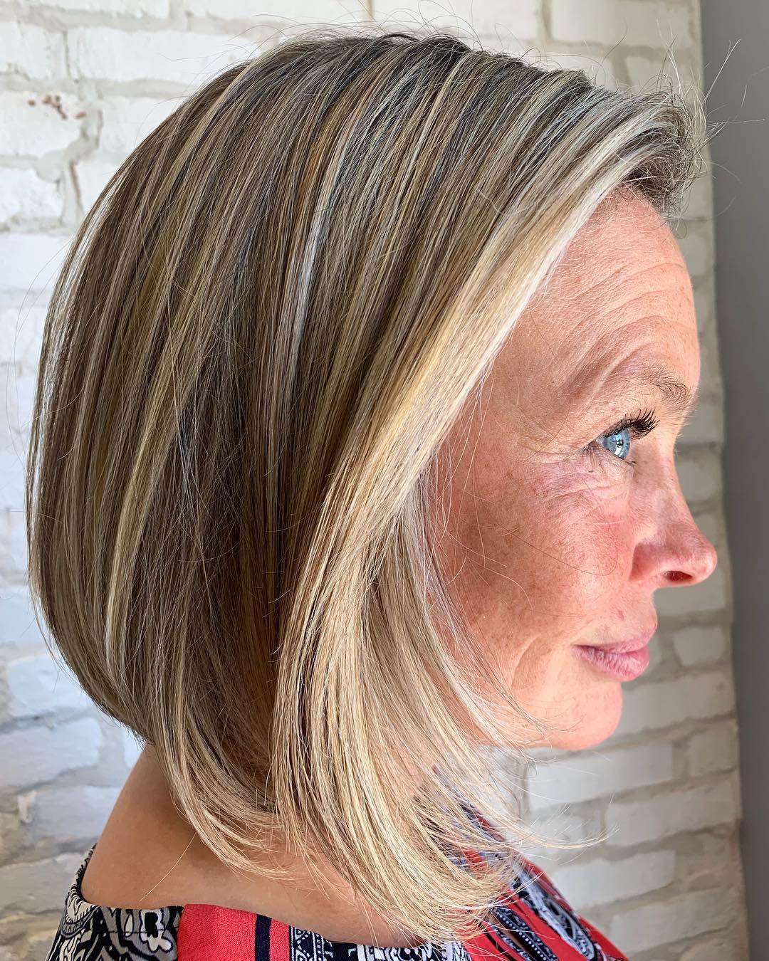 Smooth Ash Blonde Bob With Highlights — Winter Hair Colors for Women Over 40