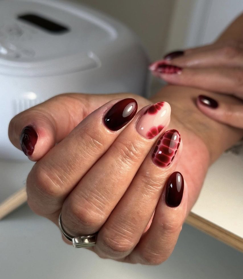 Artistic Burgundy Oval Nails with Abstract Dark Red Patterns — Burgundy Nails