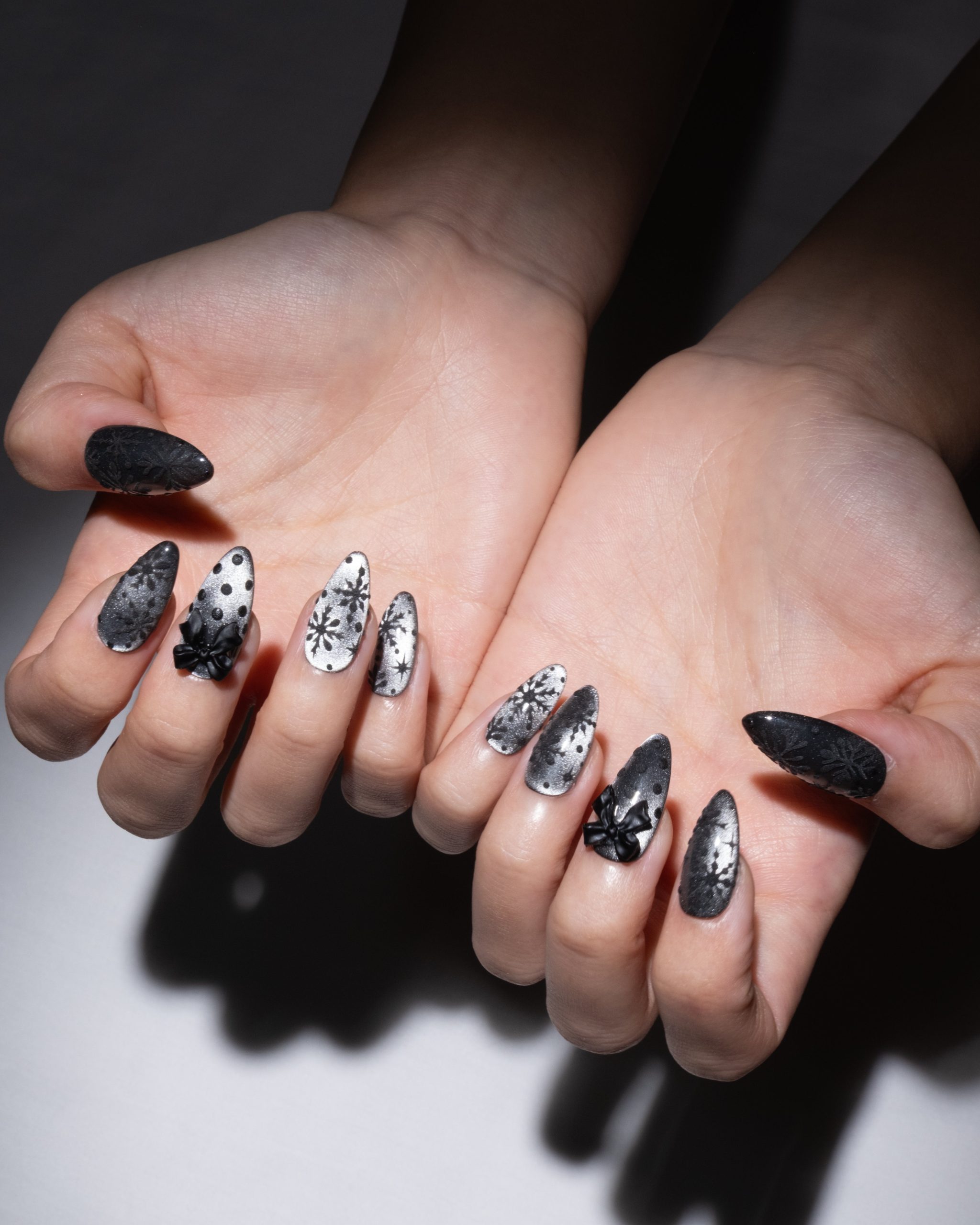 Dramatic Matte Black with Embossed Snowflakes Dramatic Matte Black with Embossed Snowflakes — Winter Black Nails