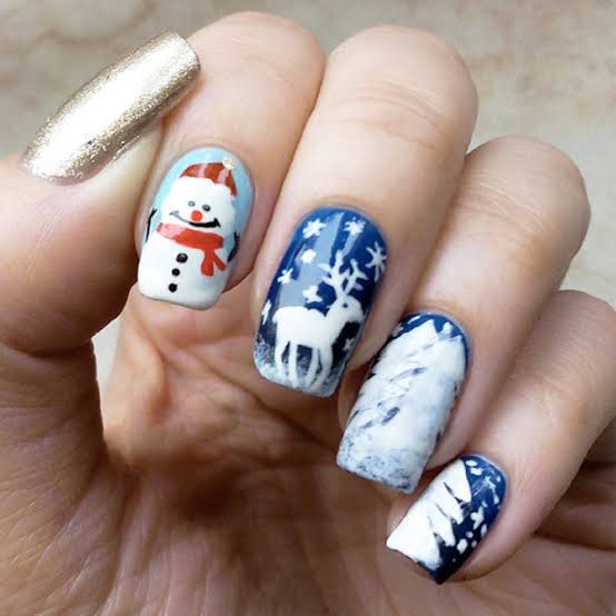 Hand-Painted Snowman Reindeer Almonds — Winter Wonderland Nails