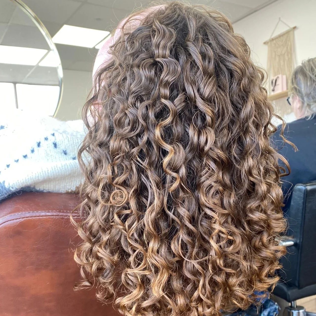 Layers Medium Brown With Subtle Caramel Highlights Layers Medium Brown With Subtle Caramel Highlights — Winter Hair Colors for Curly Hair