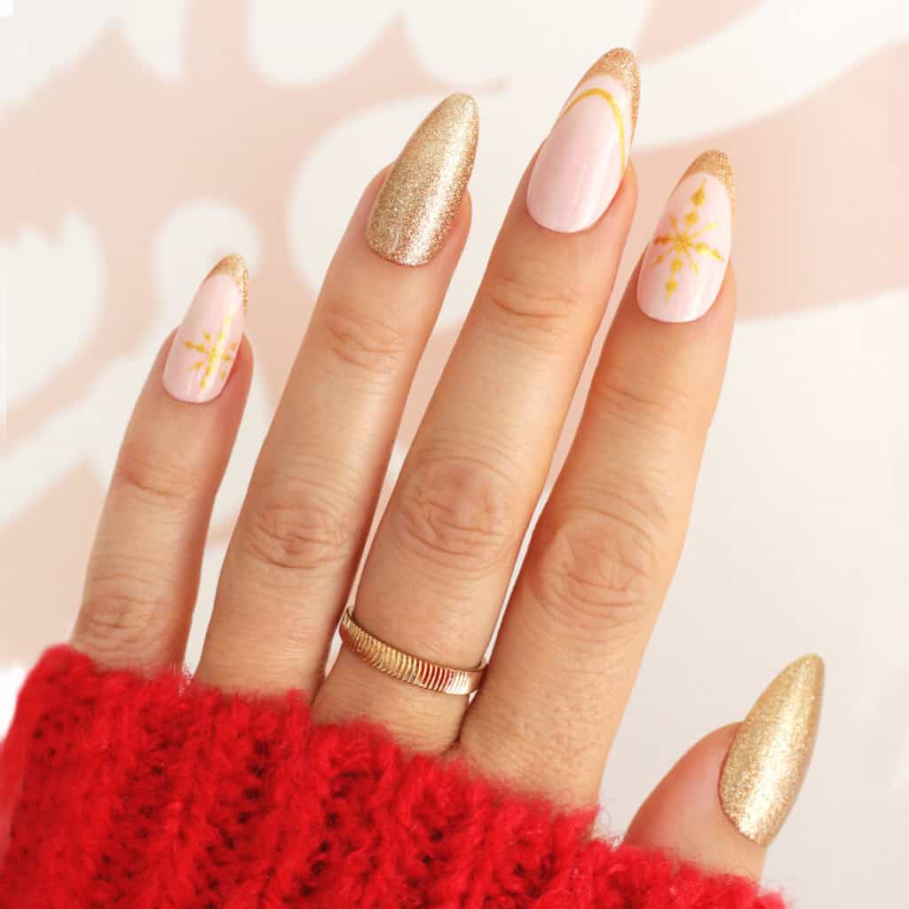 Pale Pink Almond Nails With Gold Glitter and Snowflake — Winter Almond Nails