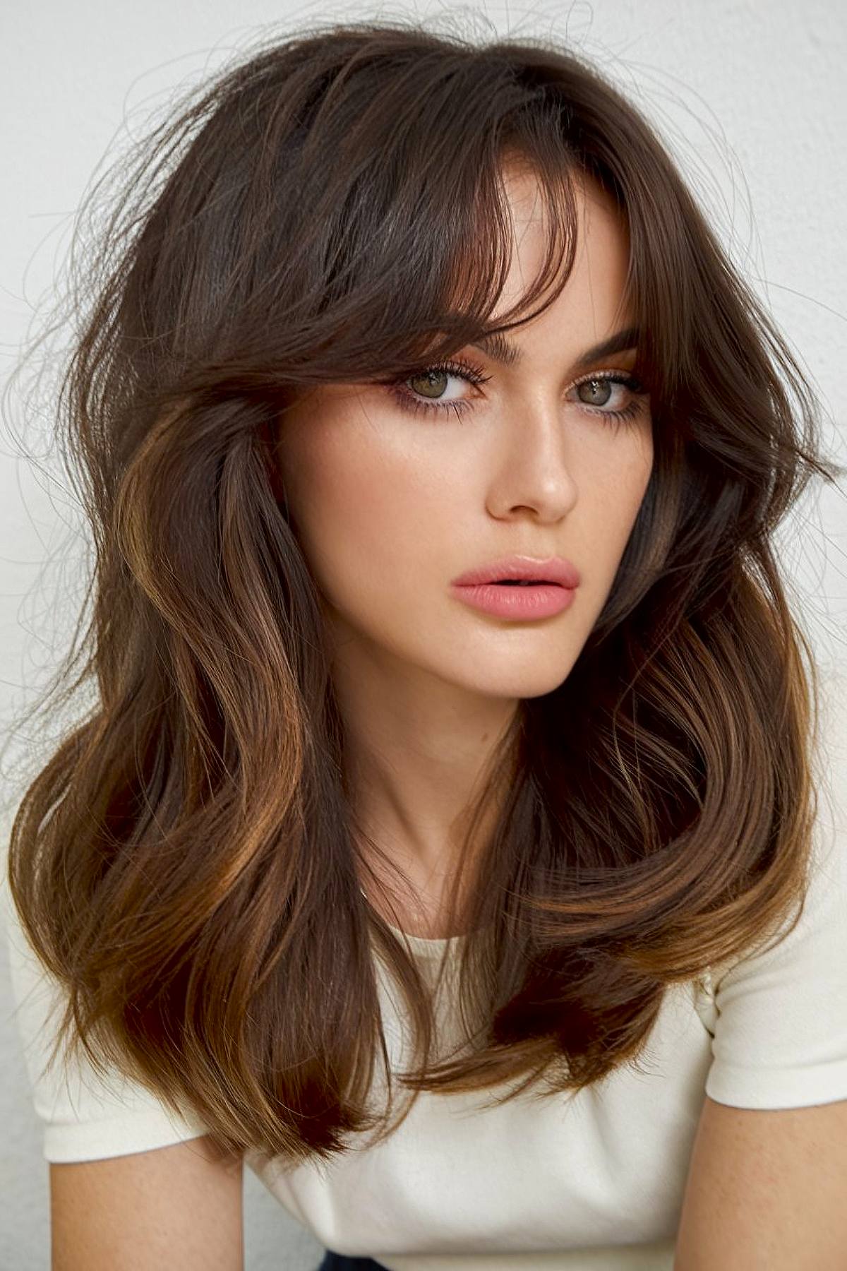 Collarbone Layered Cut With Voluminous Blowout Collarbone Layered Cut With Voluminous Blowout — Winter Haircuts for Wavy Hair