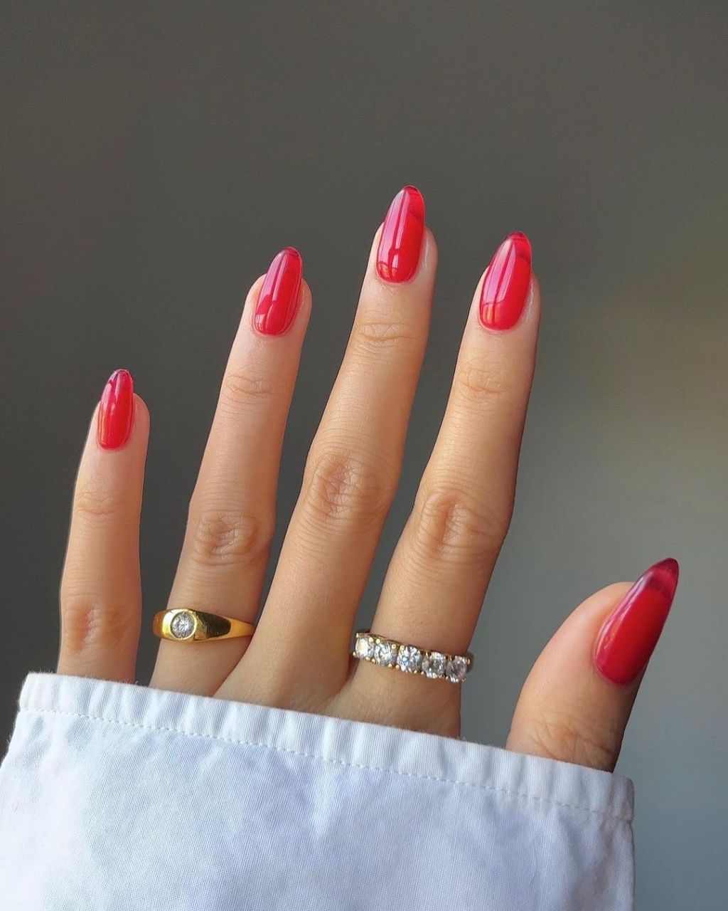 Vibrant Red Marbled Oval Nails Vibrant Red Marbled Oval Nails — Winter Nail Colors for Women Over 70