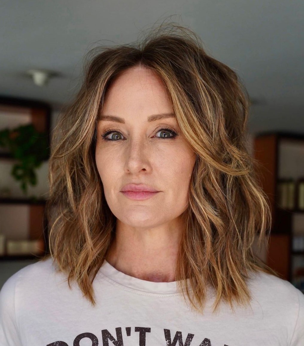 Shoulder Length Ash Blonde Blowout — Winter Hair Colors for Women Over 60