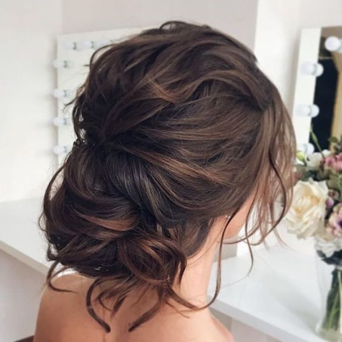 Messy Low Bun With Face-Framing Tendrils Messy Low Bun With Face-Framing Tendrils — Easy Winter Hairstyles