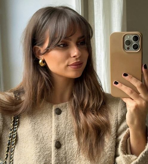 Mid-Back Visual Idea — Winter Haircuts with Bangs