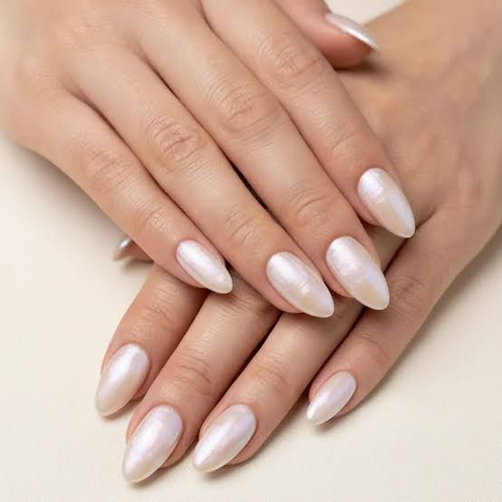 Pale Pearlescent White Almond Nails Pale Pearlescent White Almond Nails — Medium Length Winter Nails