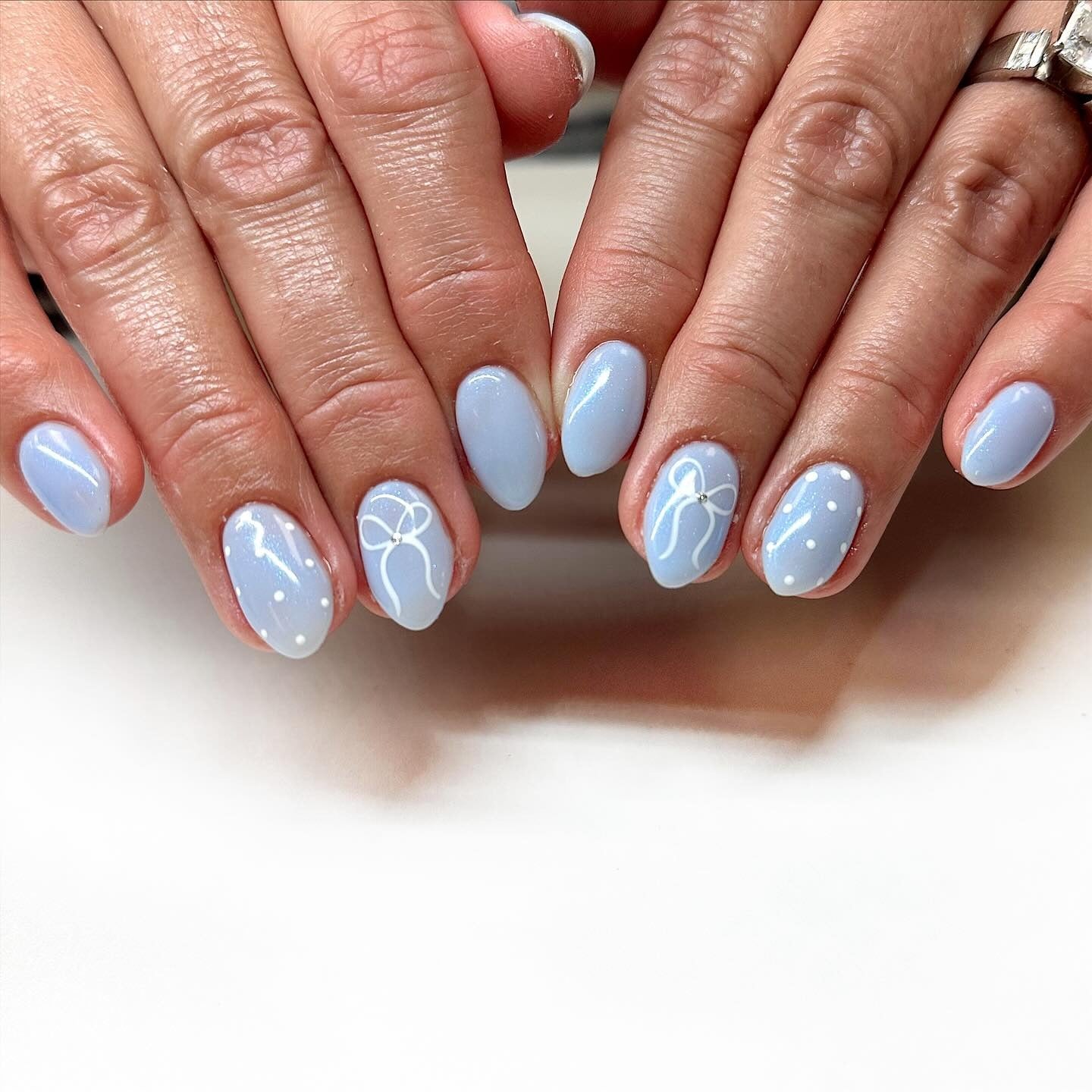 Pale Sky Blue Bow Shimmery Nails Pale Sky Blue Bow Shimmery Nails — Short Winter Nails