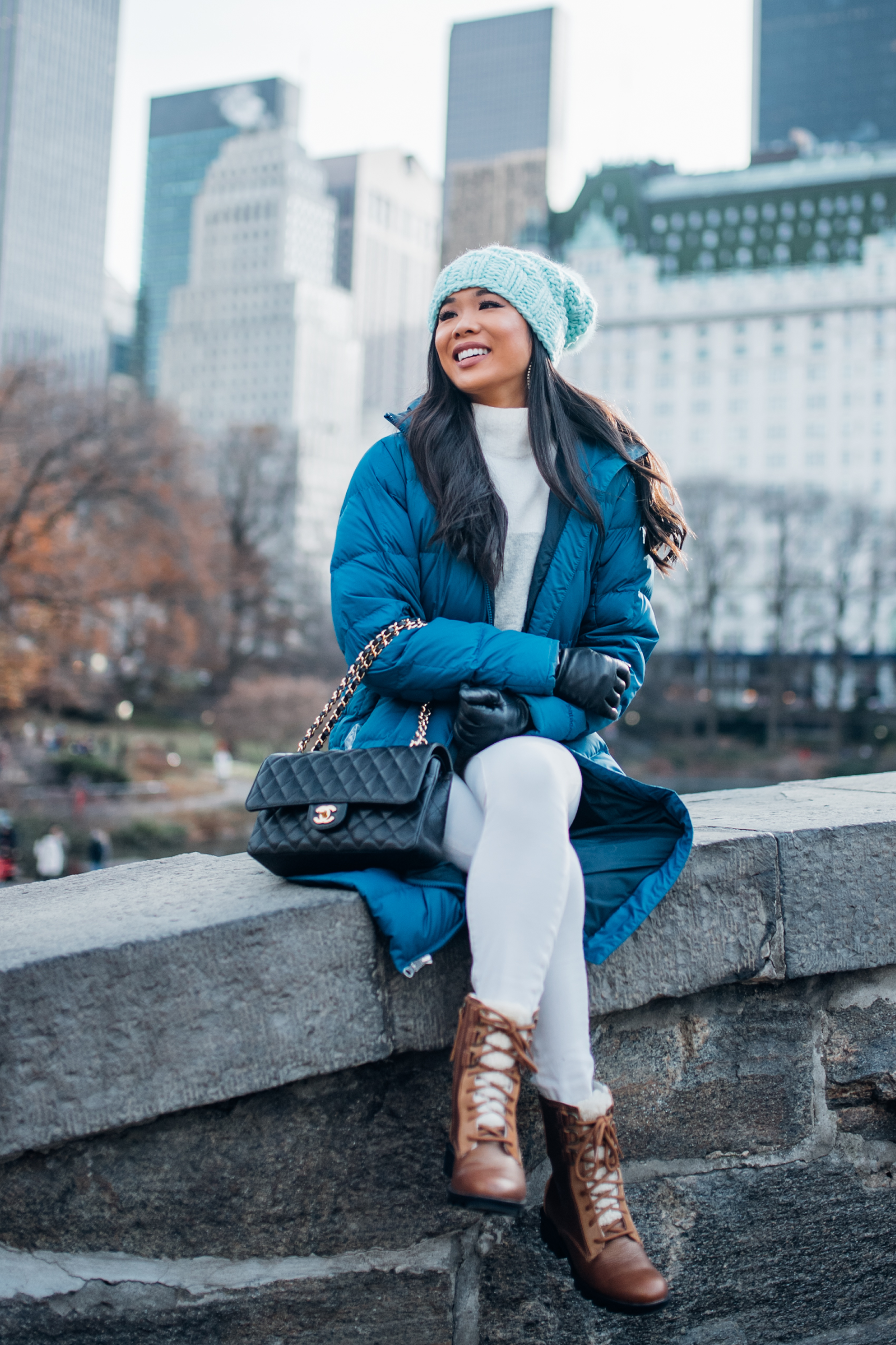 Teal Puffer Jacket with White Turtleneck and Fur-Trimmed Boots Teal Puffer Jacket with White Turtleneck and Fur-Trimmed Boots — Snow Day Outfits