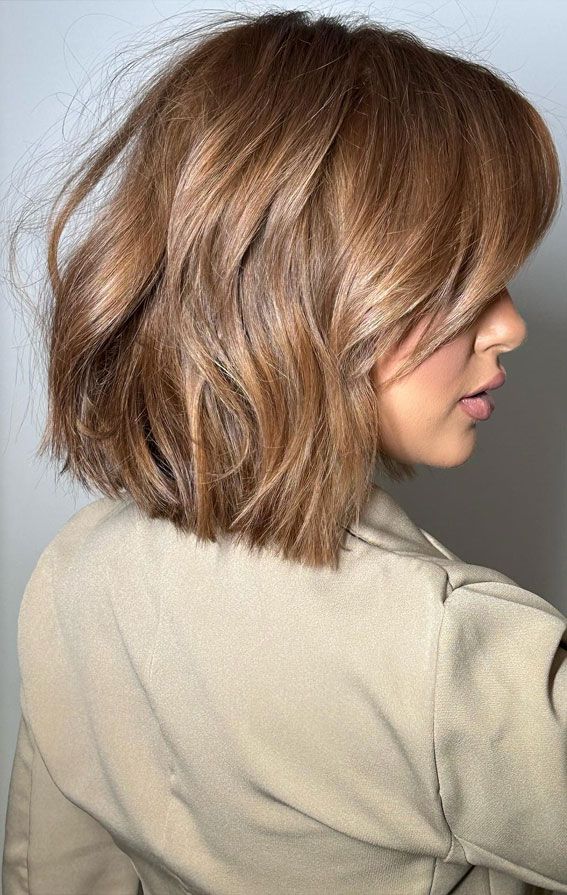 Textured Bob With Side-Swept Bangs Textured Bob With Side-Swept Bangs — Winter Hairstyles for Short Hair