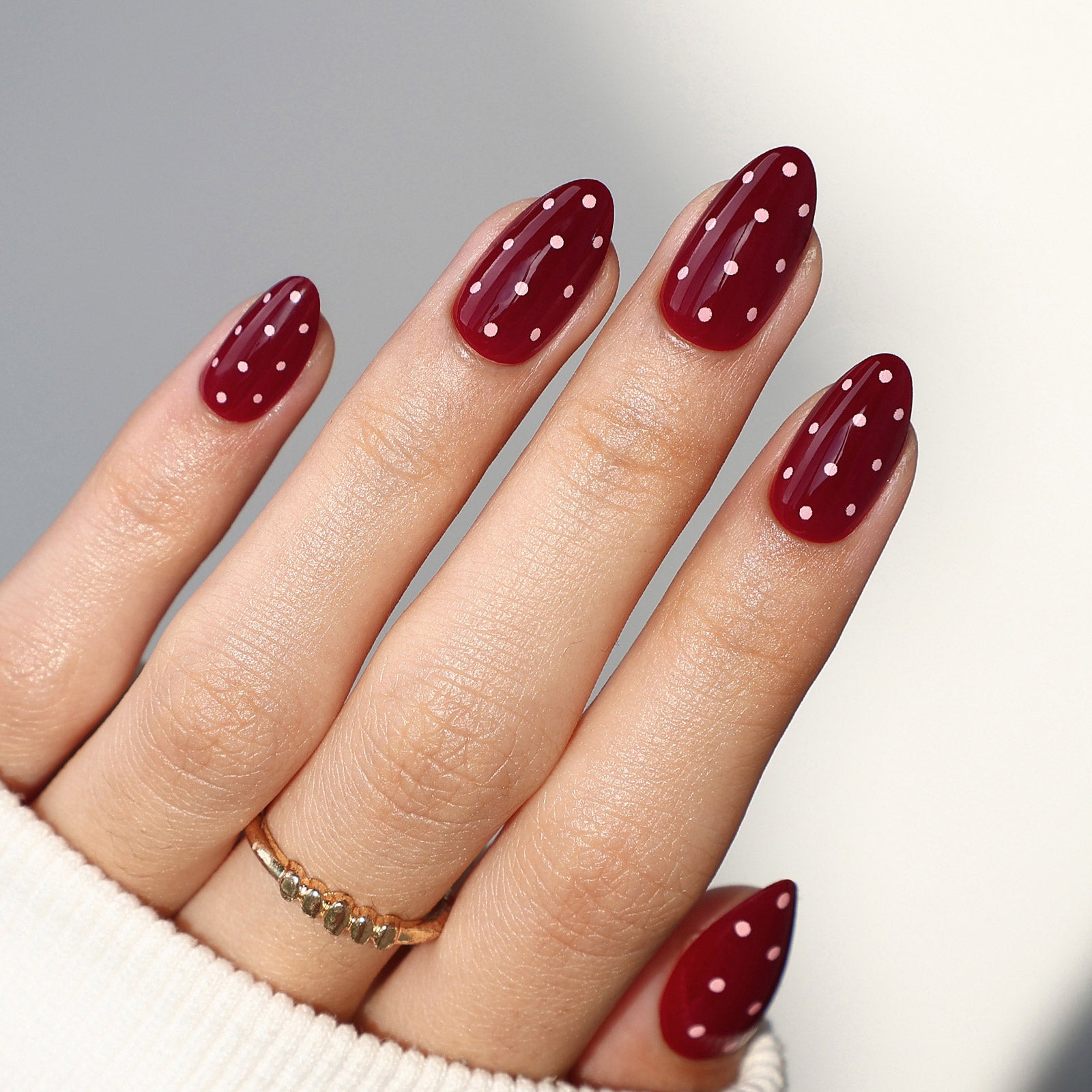 Dark Red Polka Dot Medium Almonds — Short Winter Almond Nails