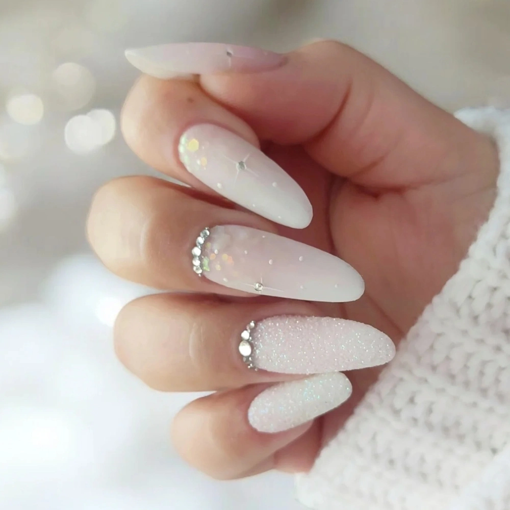 Long Stiletto with Pearlescent White and Textured Accents — Winter White Nails