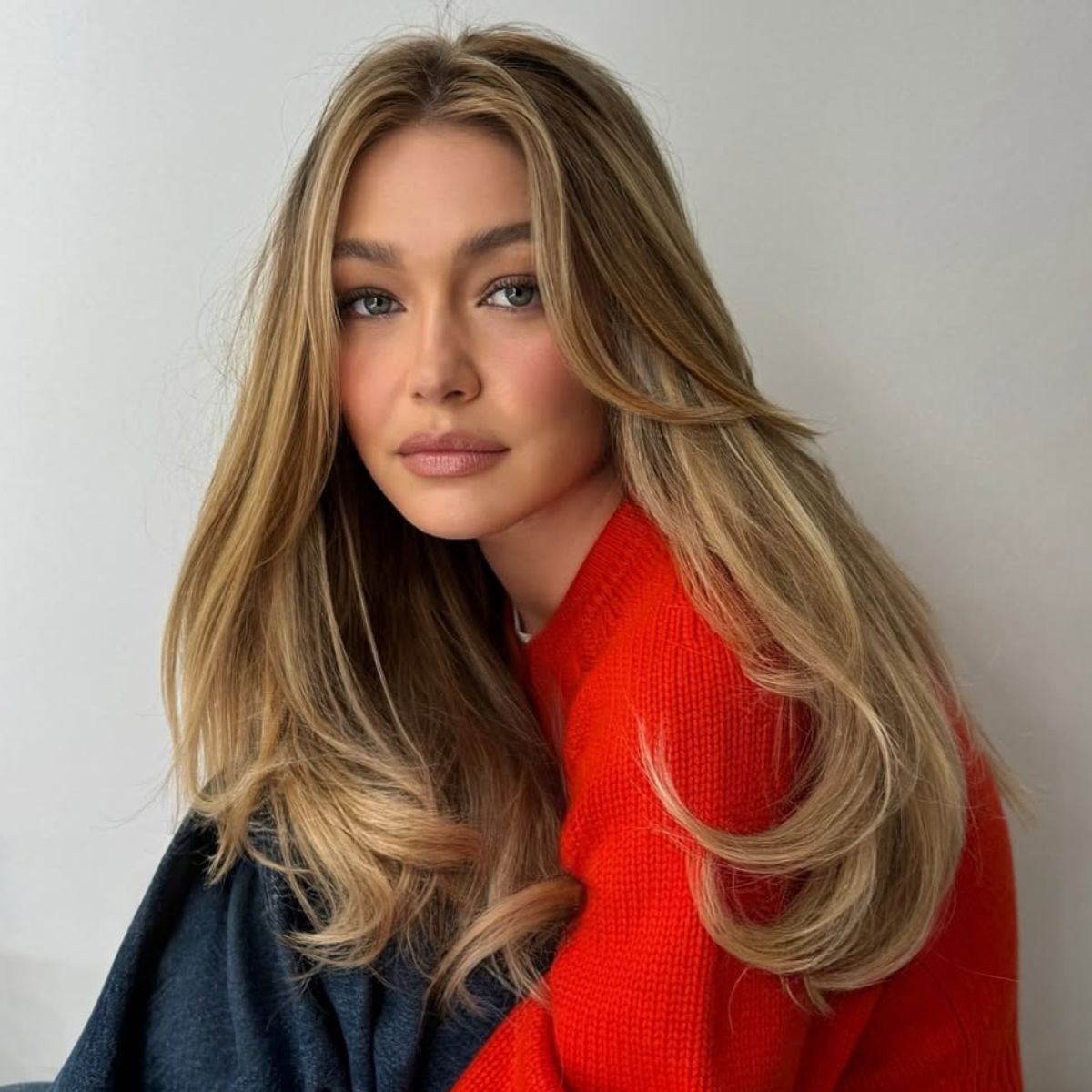 Long Honey Blonde With Blended Balayage — Winter Haircuts with Curtain Bangs