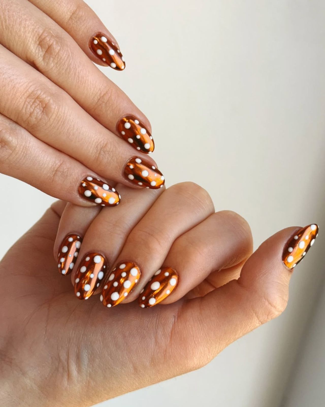 Metallic Copper Chrome with White Polka Dots Metallic Copper Chrome with White Polka Dots — Winter Nail Designs