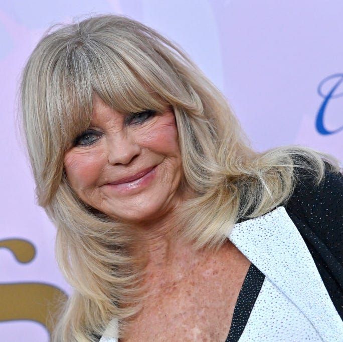 Ash Blonde Layered Bob With Side Bangs — Winter Hairstyles for Women Over 60