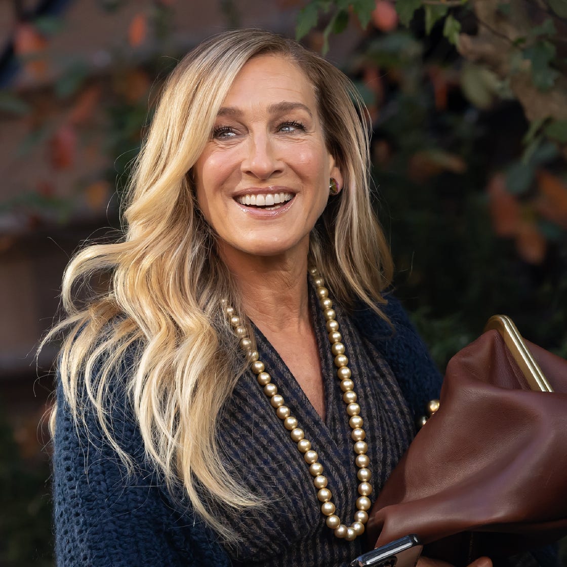 Ash Blonde Wavy Hair with Highlights — Winter Hair Colors for Women Over 60