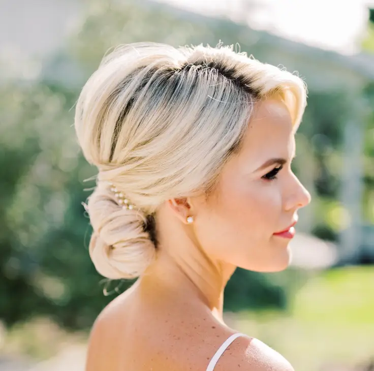 Platinum Blonde Twisted Low Bun Platinum Blonde Twisted Low Bun — Winter Haircuts for Heart Shaped Faces