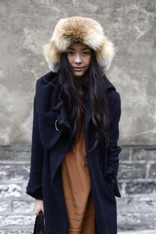 Textural Warmth: Fur Hat with Navy Coat and Rust Dress — Fur Hat Outfits