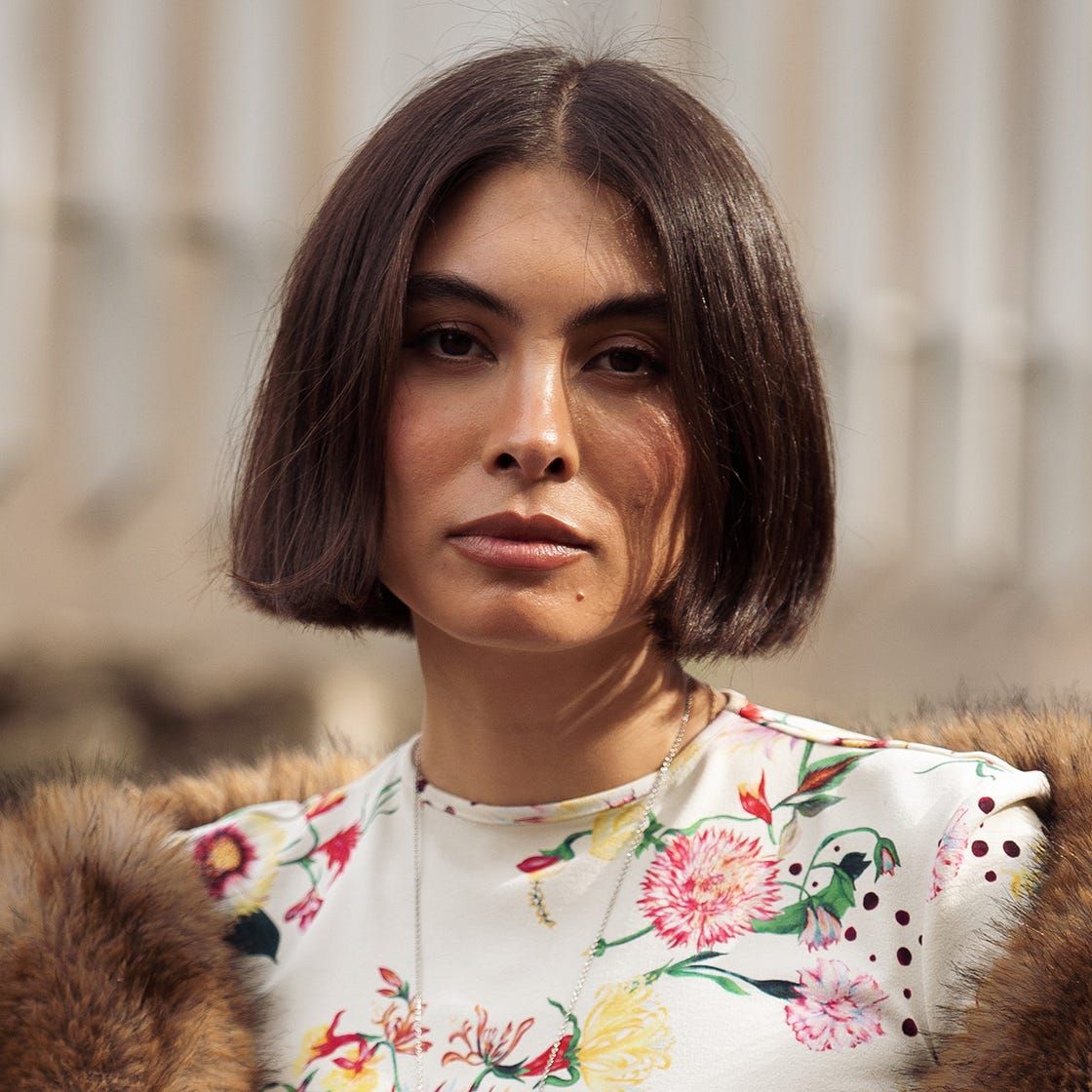 Voluminous Warm Brown Blowout With Soft Curls — Winter Haircuts for Girls