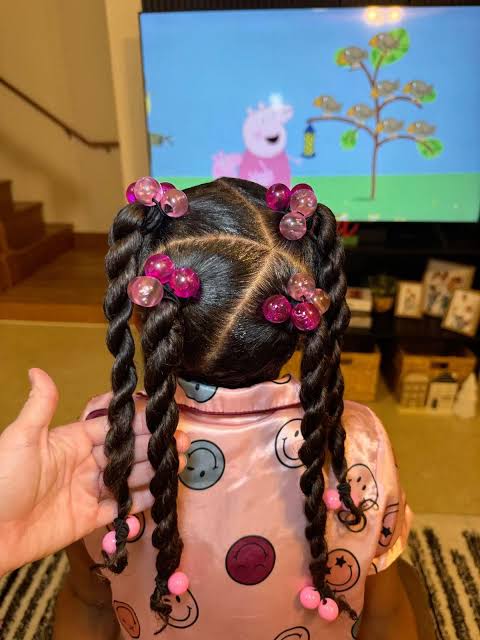 Two Thick Braids with Pink Beads Two Thick Braids with Pink Beads — Winter Hairstyles for Black Kids