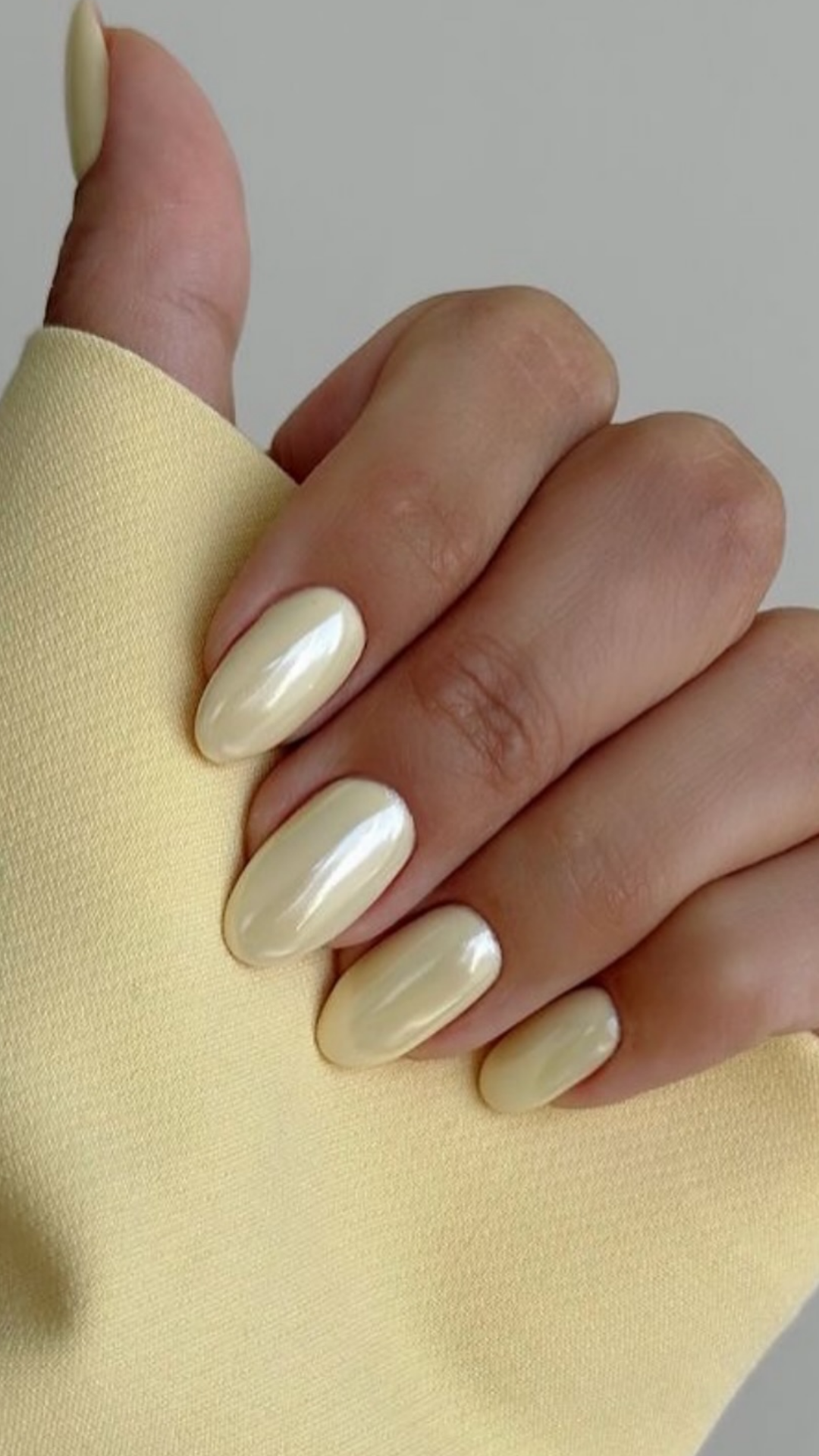 Pale Creamy Yellow Pearlescent Oval Pale Creamy Yellow Pearlescent Oval — Winter to Spring Transition Nails