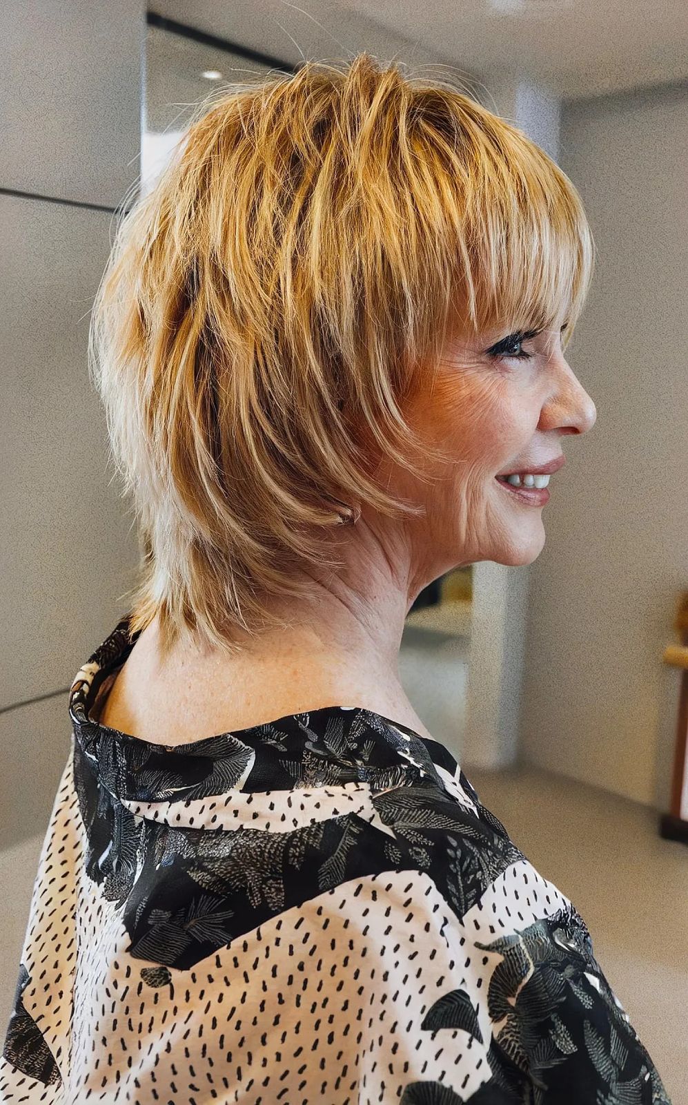 Textured Blonde Shag With Choppy Bangs Textured Blonde Shag With Choppy Bangs — Winter Hairstyles for Women Over 70