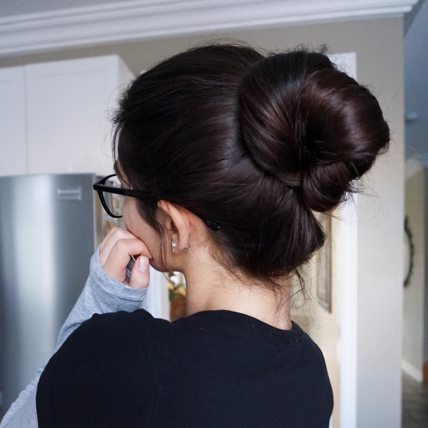 Sculpted Dark Brown High Bun — Winter Updos
