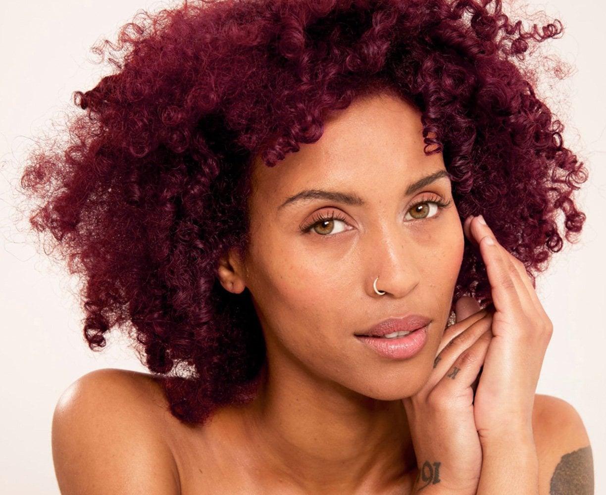 Deep Burgundy Afro with Auburn Undertones — Winter Hair Colors for Black Women