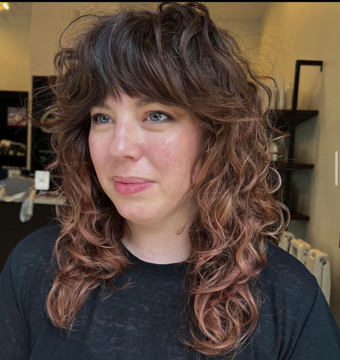 Shag With Pink Highlights — Winter Haircuts for Curly Hair