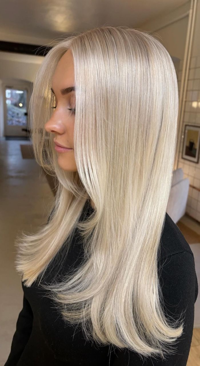 Sleek Nordic Blonde With Layers — Winter Haircuts for Long Faces