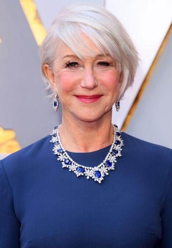 Platinum Blonde Pixie Bob with Asymmetry — Winter Haircuts for Women Over 70