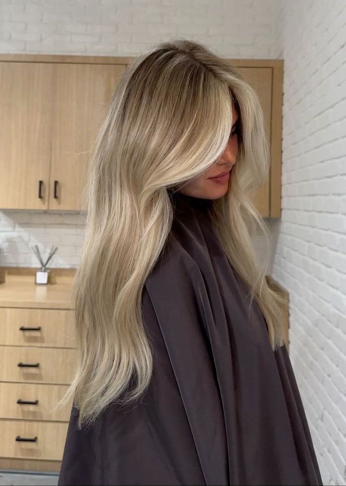 Platinum Blonde Mid-Back Waves — Winter Hair Colors for Women Over 40
