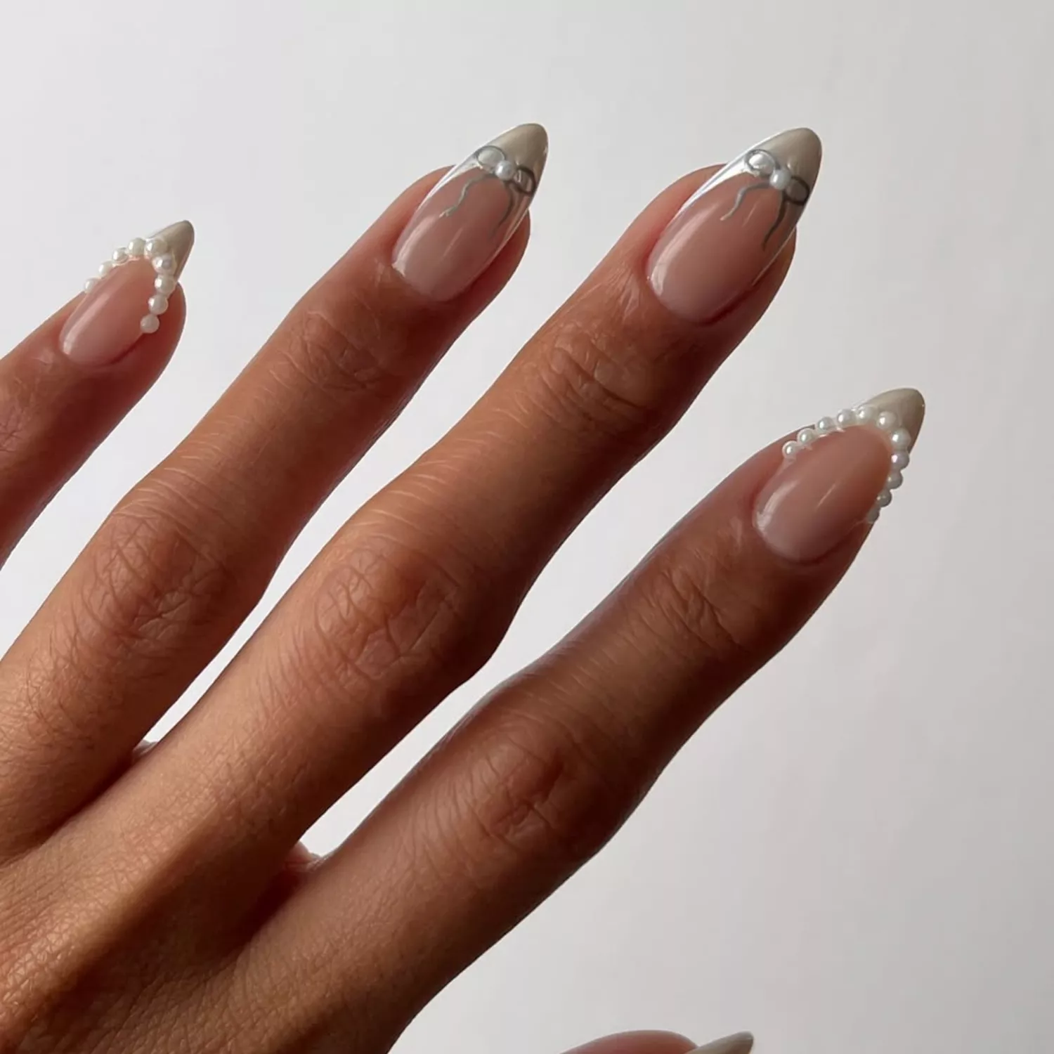 Pearl-Edged French Tips on Long Stilettos — Winter White Nails