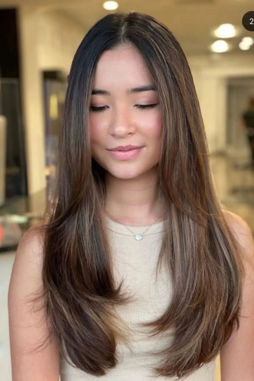 Dark Brown With Subtle Highlights Mid-Back Straight Layers — Winter Haircuts for Long Faces
