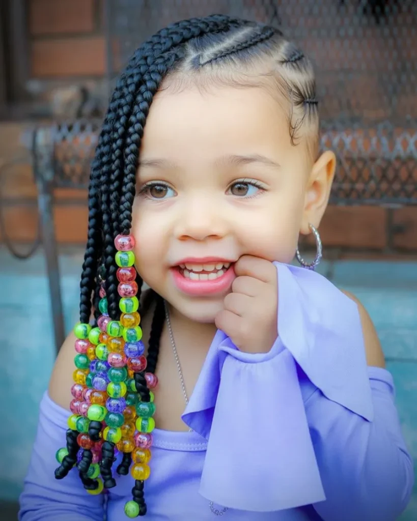 Colorful Beads on Shoulder-Length Braids Colorful Beads on Shoulder-Length Braids — Winter Hairstyles for Black Kids
