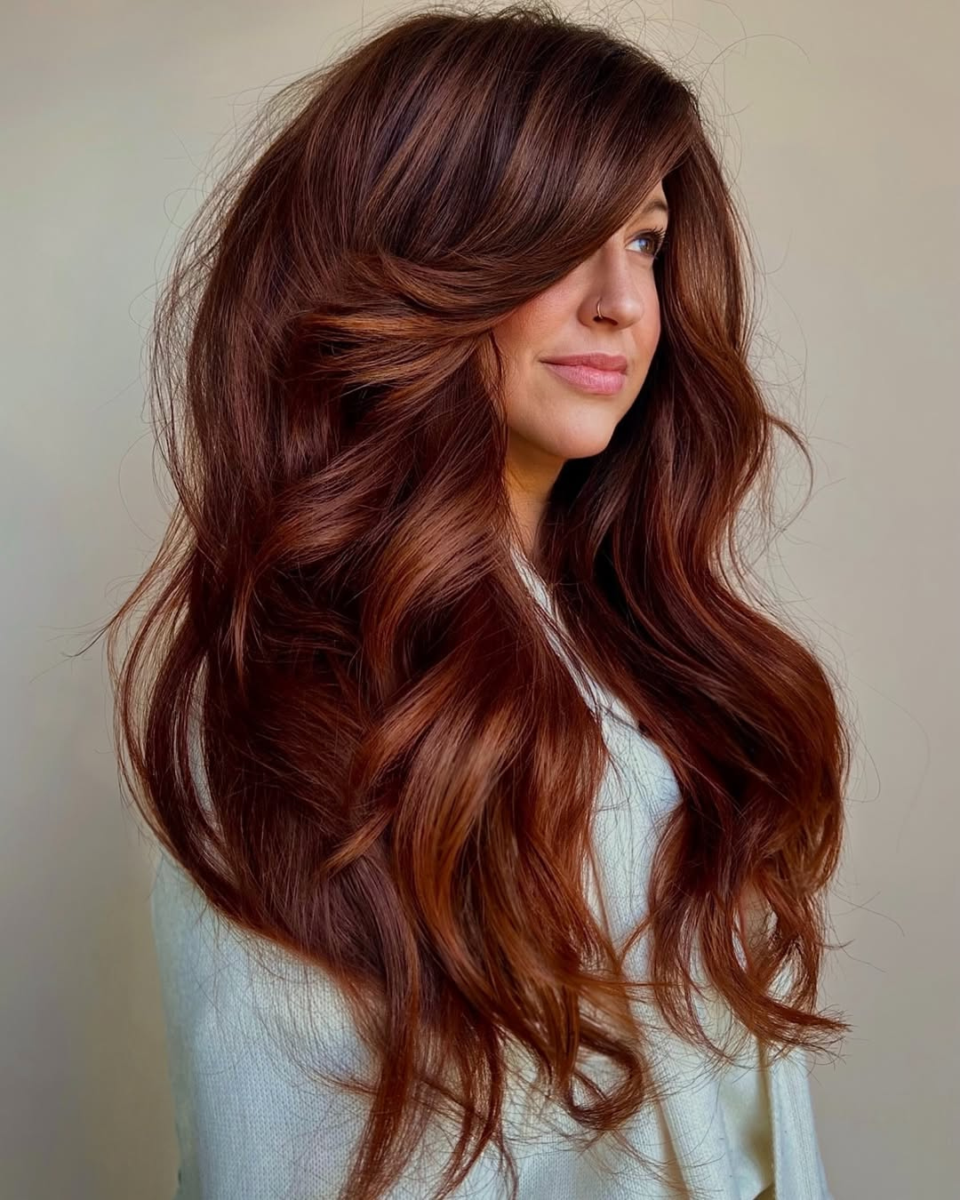 Deep Auburn Blowout with Face-Framing Layers — Winter Auburn Hair Color