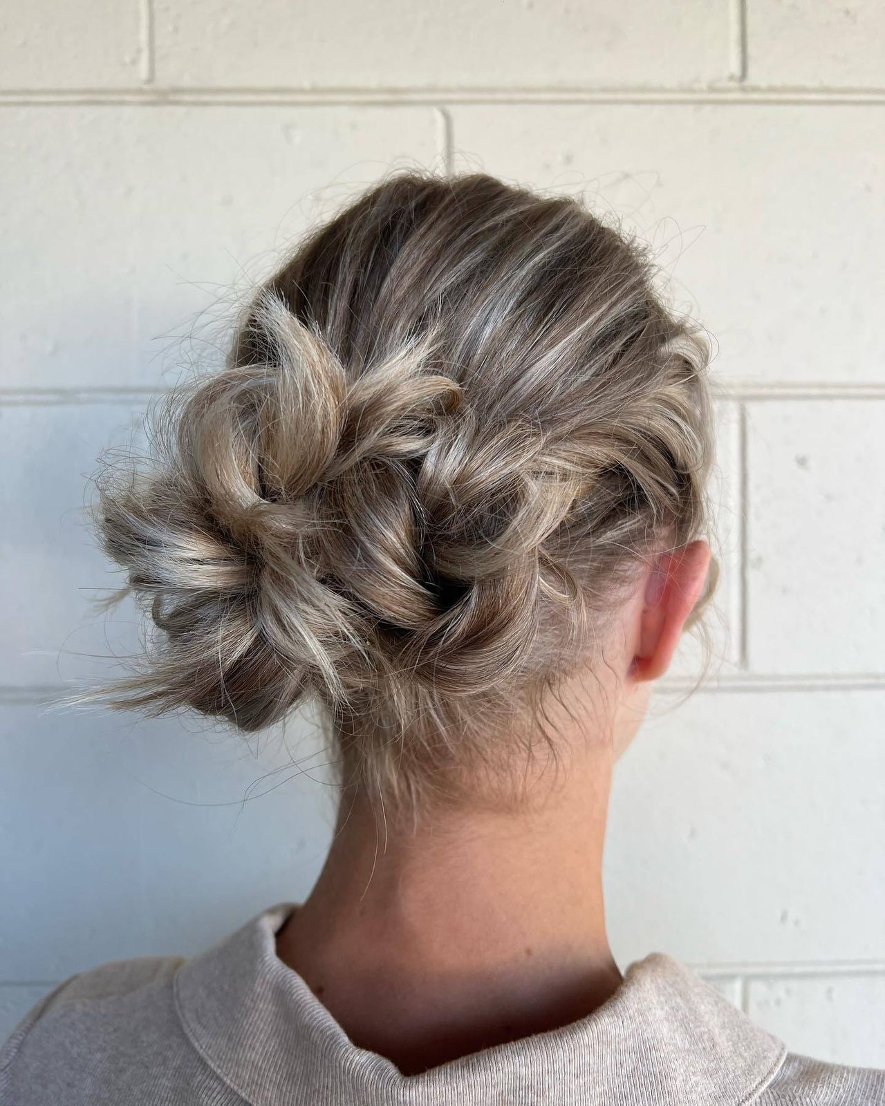 Messy Bun With Intricate Braids Messy Bun With Intricate Braids — Winter Hairstyles for Work