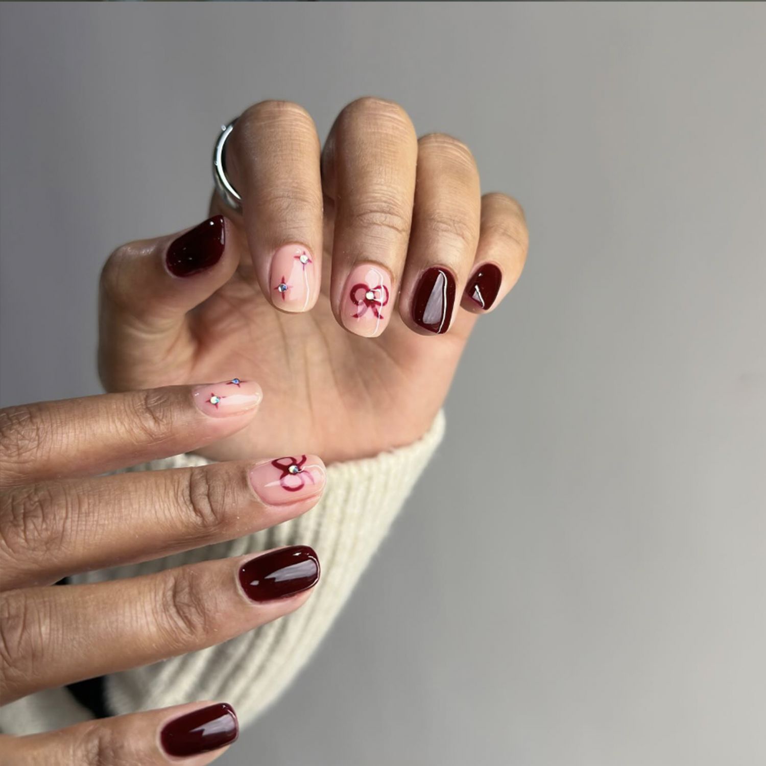 Burgundy & Pink Bows with Gems Burgundy & Pink Bows with Gems — Winter Nail Colors for Women Over 60