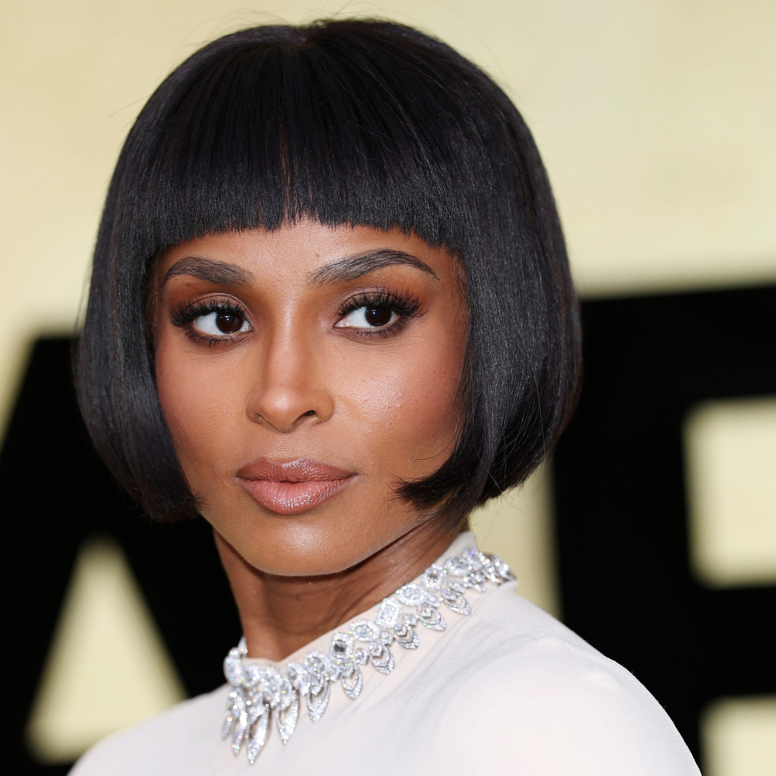 Bob with Sharp Blunt Bangs — Winter Haircuts for Black Women