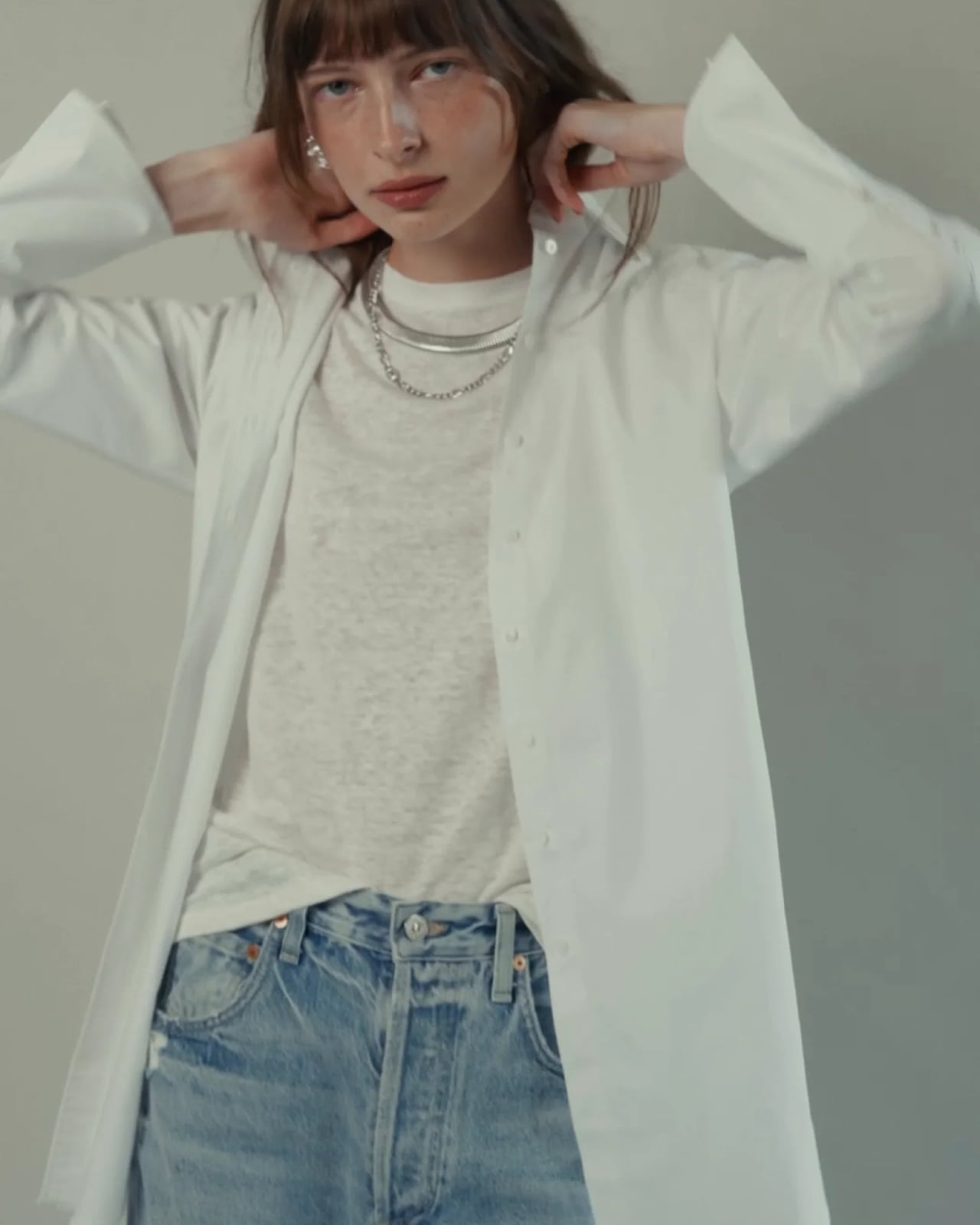 White Oversized Shirt Over Gray T-Shirt White Oversized Shirt Over Gray T-Shirt — Aesthetic White Blouse Outfit
