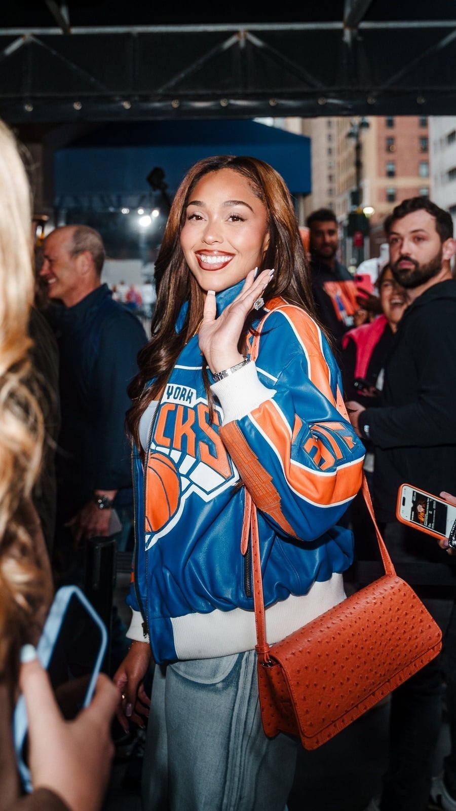 Oversized Knicks Bomber Jacket With Gray Trousers Oversized Knicks Bomber Jacket With Gray Trousers — Basketball Game Outfits