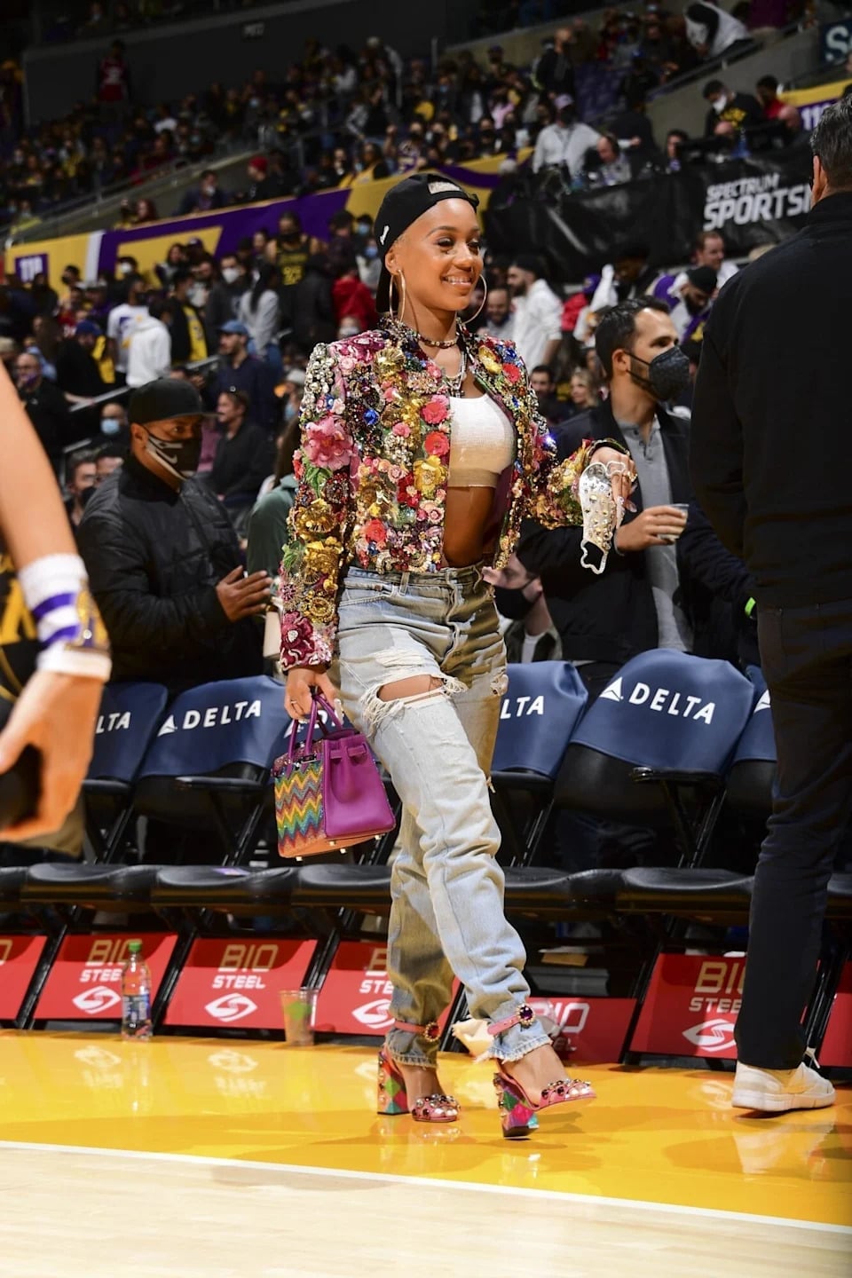 Embellished Jacket Over Bralette and Distressed Jeans Embellished Jacket Over Bralette and Distressed Jeans — Basketball Game Outfits