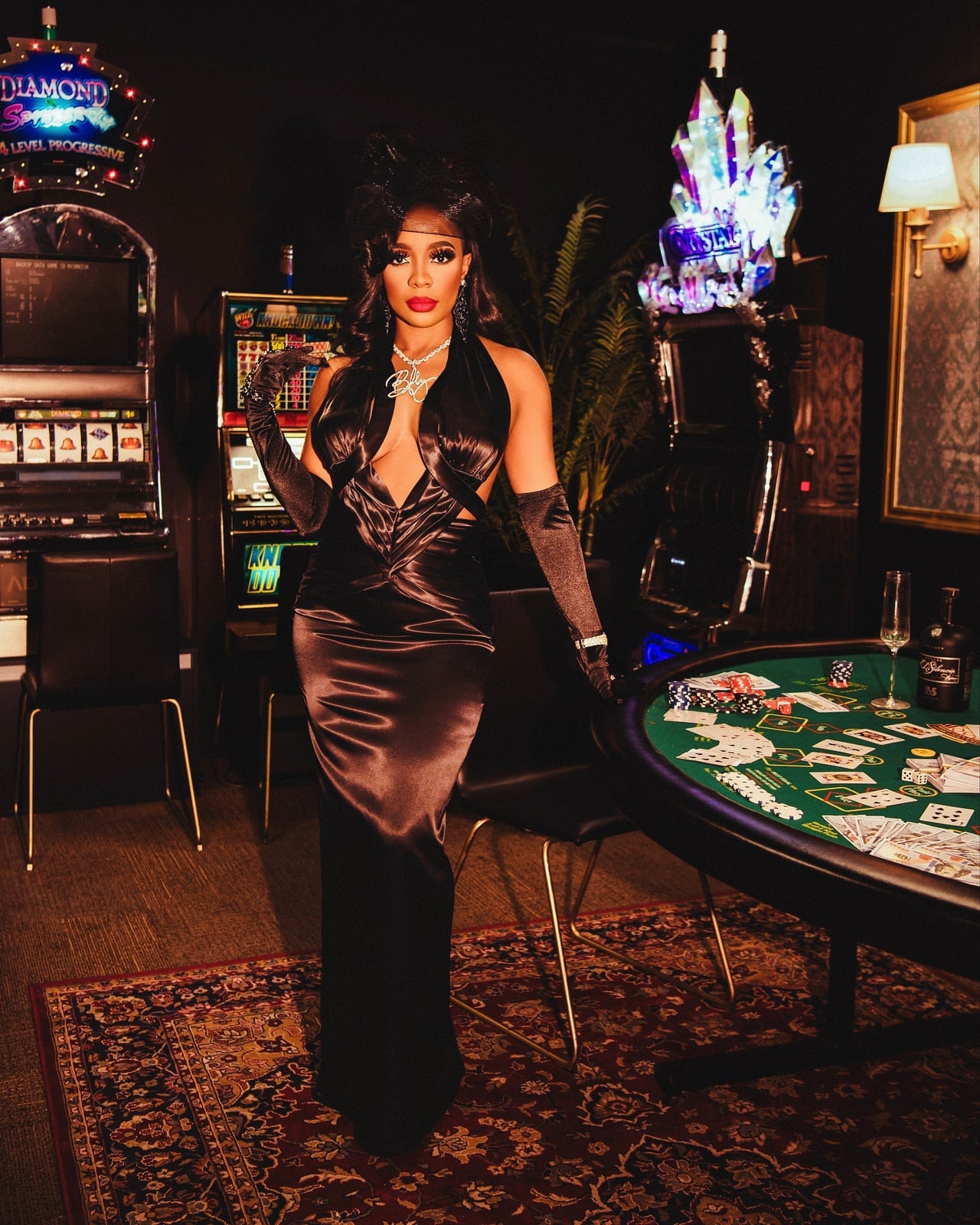 Dramatic Black Satin Gown with Cutouts for a Statement — Casino Outfits