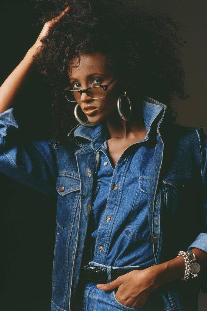 Teal Leather Trench Coat Over Orange Turtleneck — Classy 80s Style