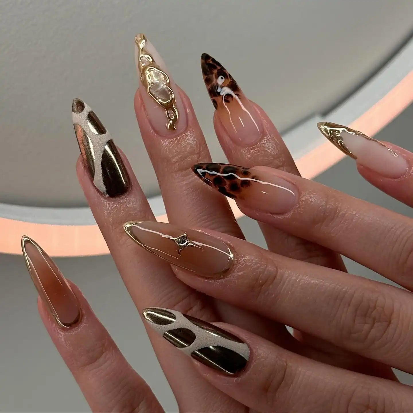 Long Stiletto with Gold Accents and Animal Print — Classy Abstract Nails