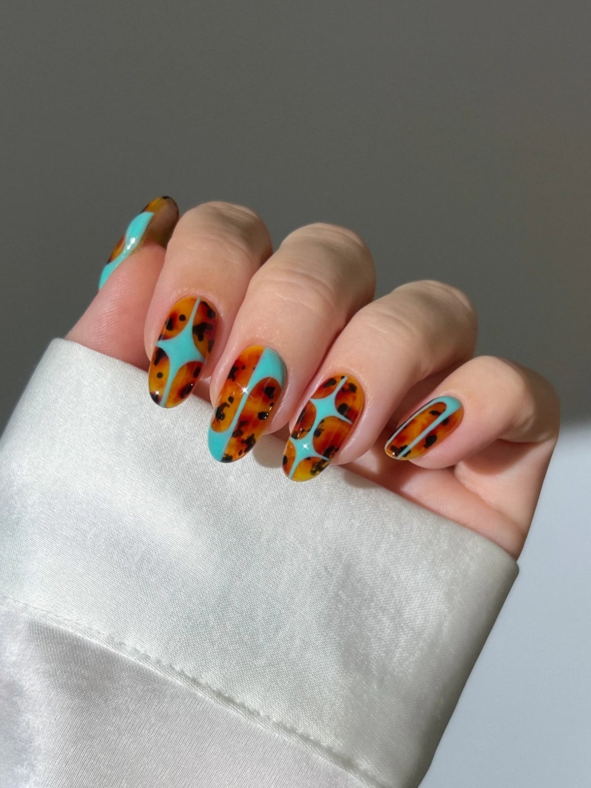 Turquoise Tortoiseshell Star Shapes — Classy Abstract Nails
